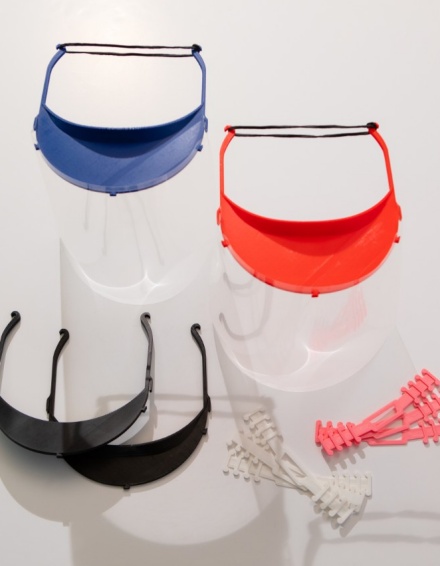 Zoom image: 3D-printed face shields and comfort bands made by a team of UB dental students. Photo: Douglas Levere 