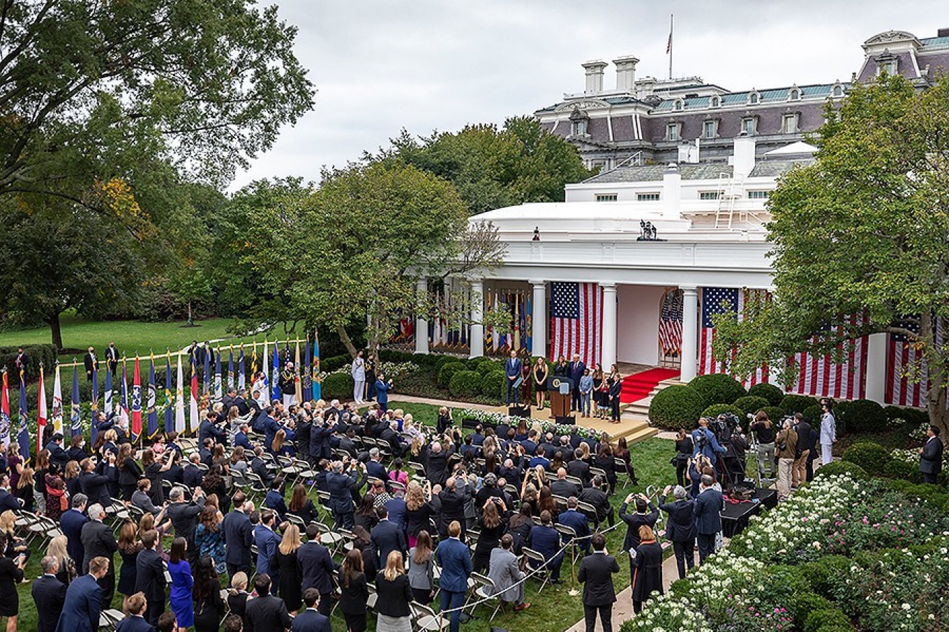 Zoom image: President Donald Trump and First Lady Melania Trump pose for a photo with Judge Amy Coney Barrett and her family members after being announced as the president’s nominee for associate justice of the Supreme Court on Sept. 26 in the Rose Garden of the White House. UB infectious disease expert Thomas Russo says the event violated protocols for keeping participants safe from the coronavirus. Photo: Official White House photo by Amy Rossetti 