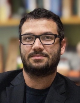headshot of Yotam Ophir. 