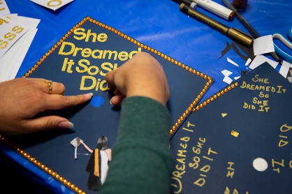 Zoom image: Media Study student Ishween Jolly attends the Trick Out Your Tassel event hosted by Student Engagement. 