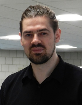 Headshot of Alexey Akimov.