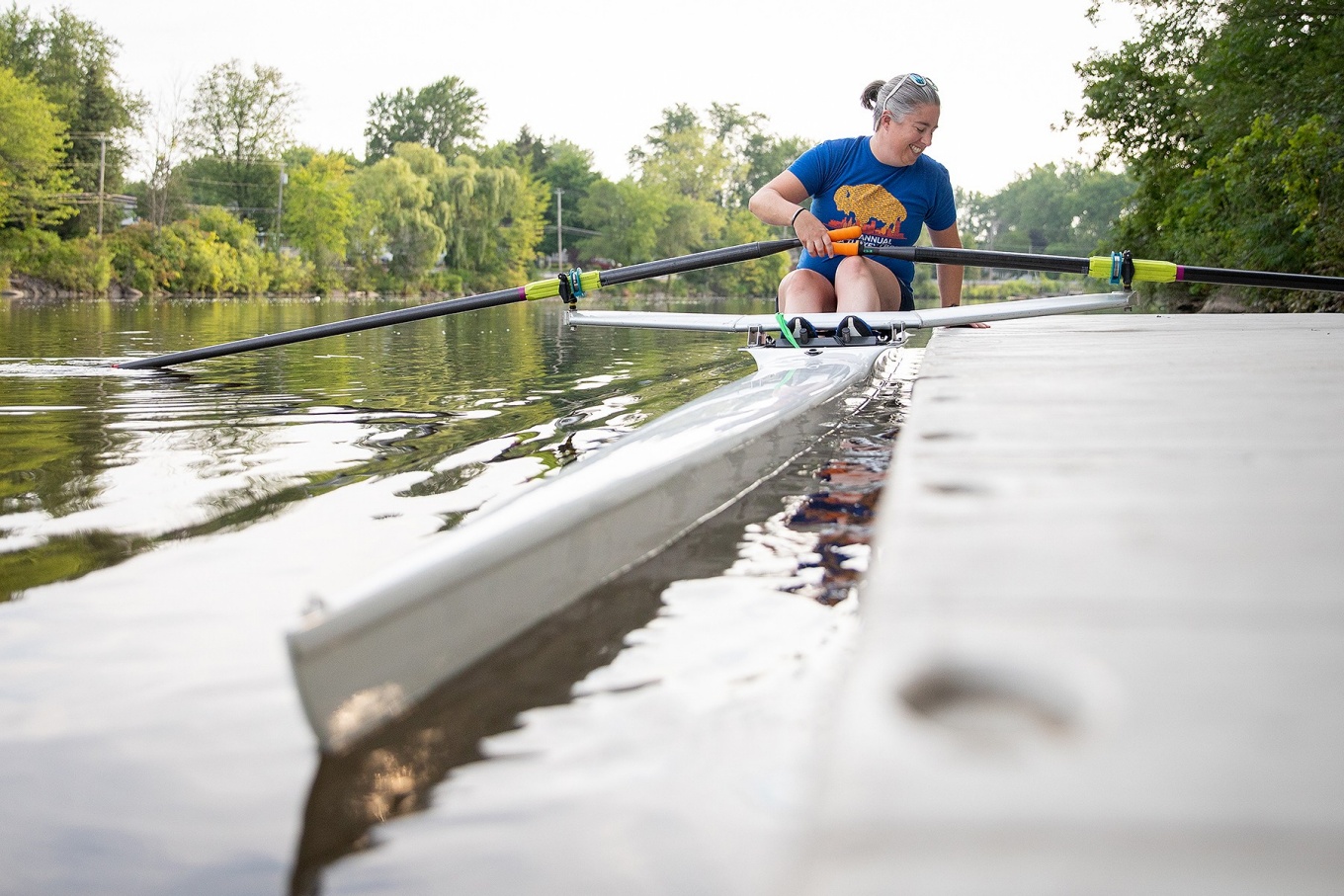 Zoom image: Barnum pushes off the dock to start her morning workout on Tonawanda Creek. 