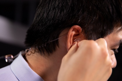 Zoom image: Lam wears an earpiece to stay connected with the control room. Photo: Meredith Forrest Kulwicki 