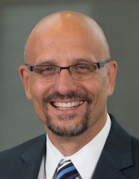 headshot of Stelios T. Andreadis. 