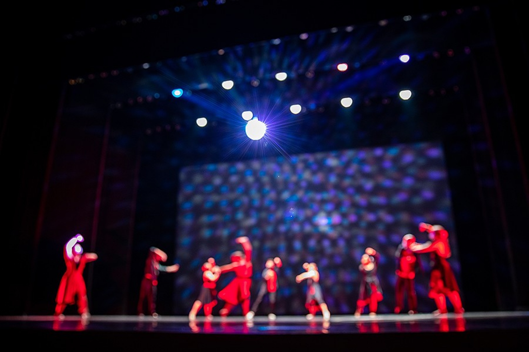 Theatre & Dance students rehearse on stage. 