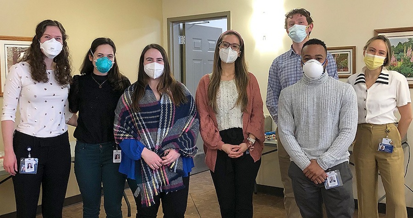 DIG members, from left, Elissa Goorman, Olivia Waldman, Delaney Lenaghan, Victoria Hoffman, Isaac Swartzman, Michael Augustin and Iryna Dovirak, participated in a community outreach event at Hope Gardens. 