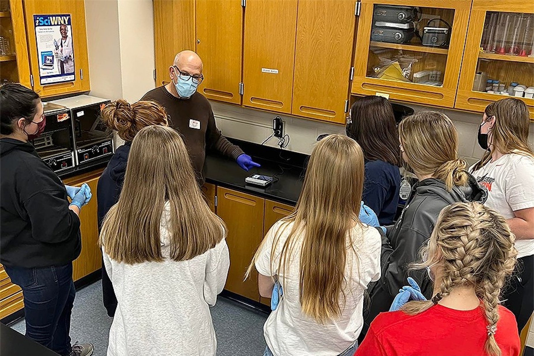 Dr. Koury instructing high school students. 