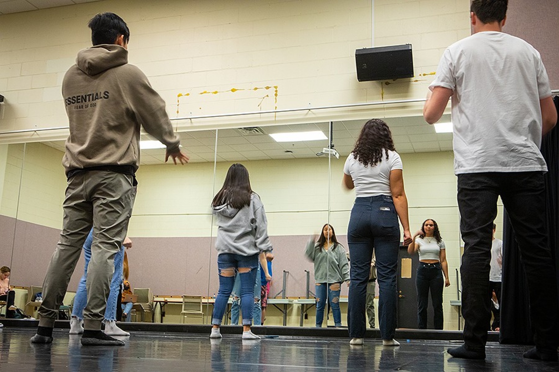 Zoom image: Students learn different movements that represent scientific concepts while developing into better dancers. It allows them to experience the lesson in a three-dimensional space, rather than viewing the elements on paper. Photo: Douglas Levere 