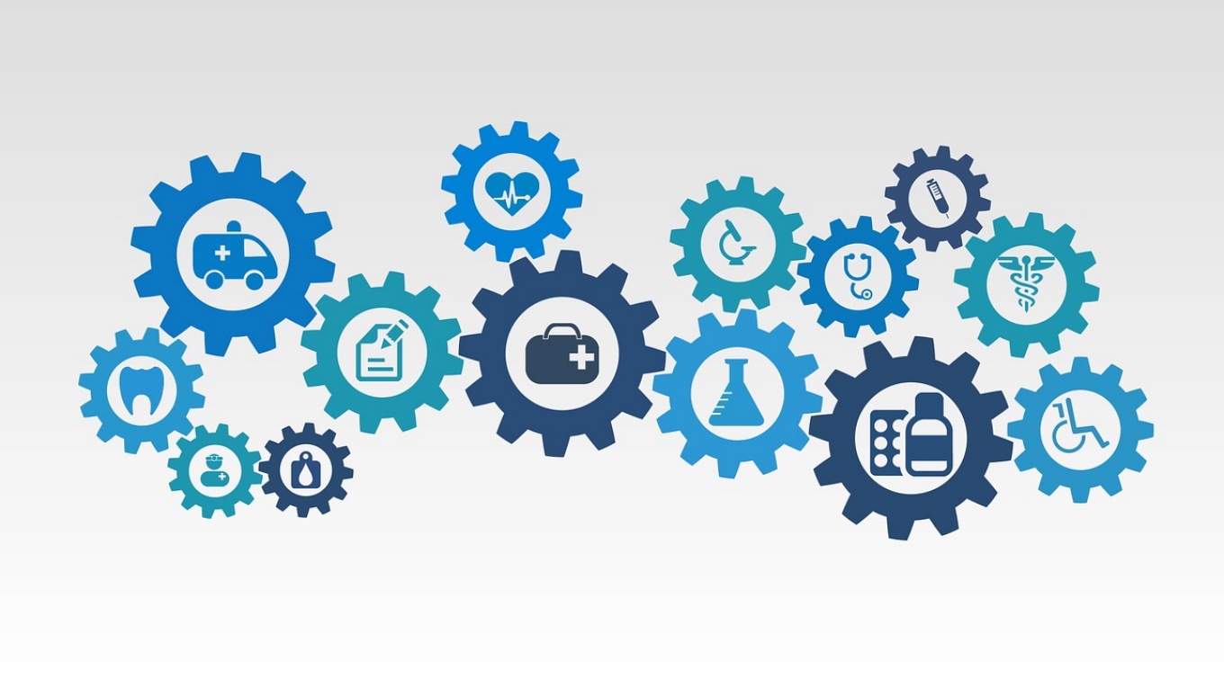 Conceptual illustration of sources of data featuring gears and icons of medical symbols. 