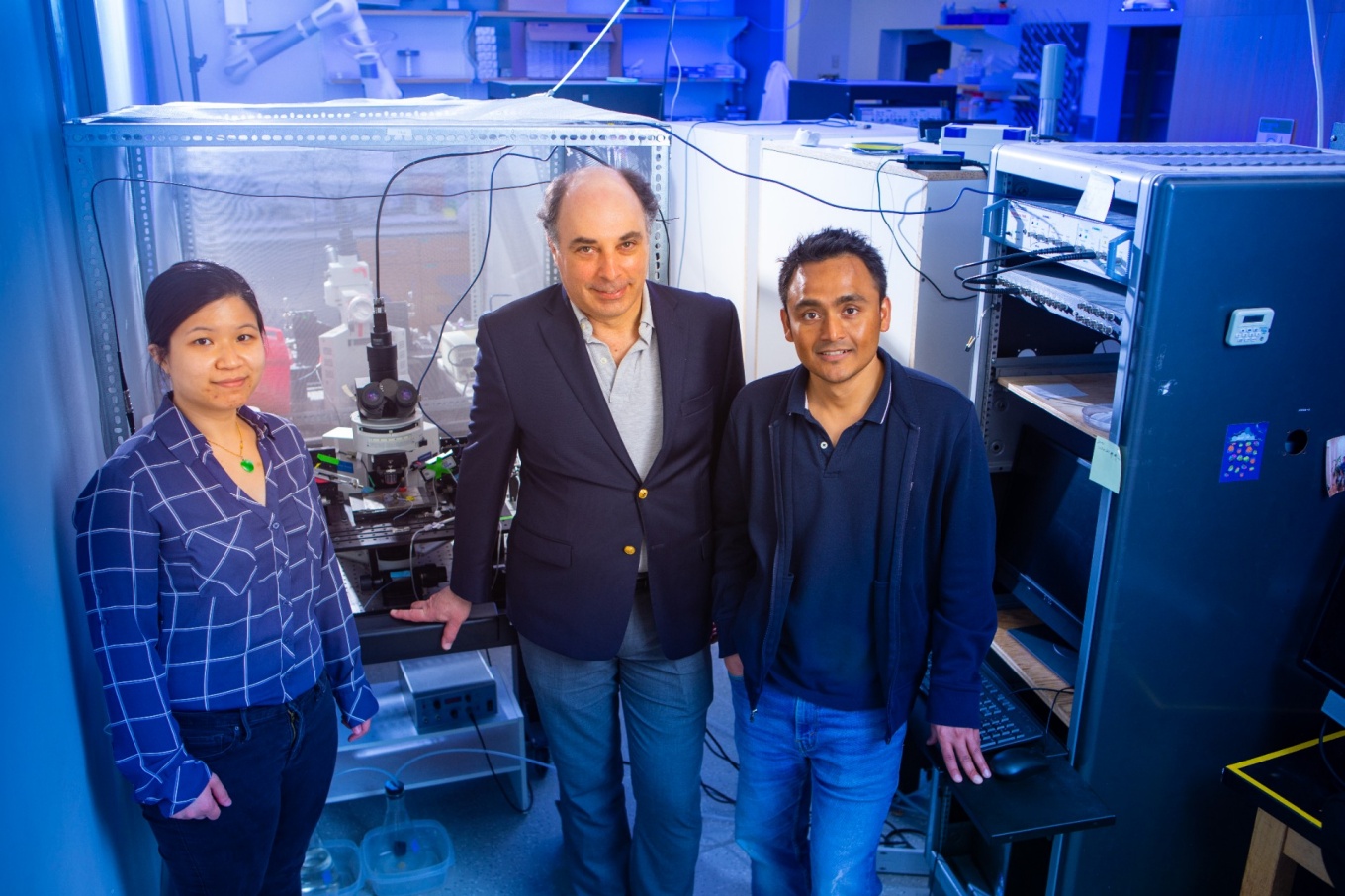 Nicole Wong, Matthew Xu-Friedman, and Soham Chanda in the lab.