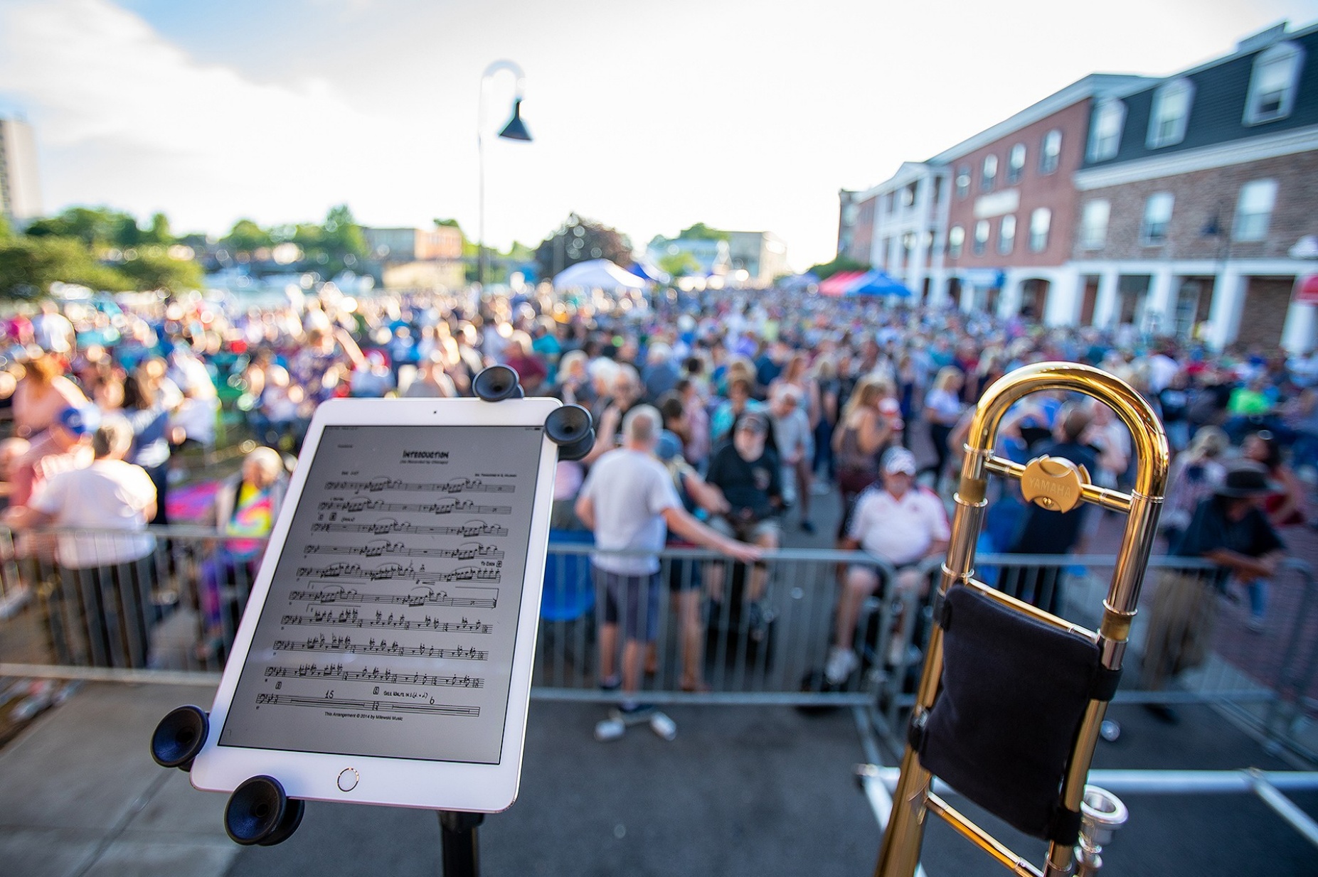 Zoom image: Sheet music is digital. The crowd continues to gather as The Chicago Authority prepares to take the stage. 