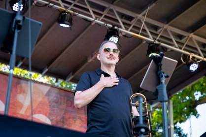 Zoom image: Mauck looks out over the crowd after taking the stage. He says the band's music takes people back to remember great times with their family and friends. 