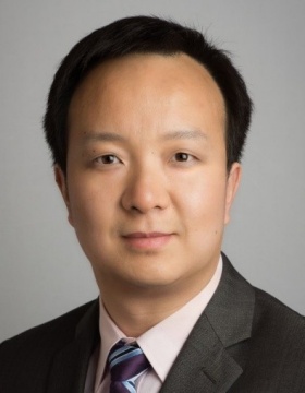 headshot of Zhanpeng Jin. 