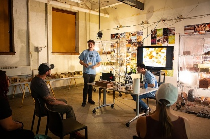 Zoom image: Participants learn about the science and chemistry behind the function of the earth’s natural materials. Photo: Meredith Forrest Kulwicki 
