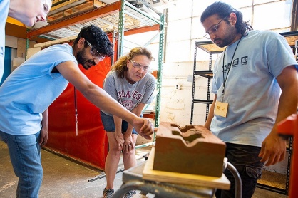 Zoom image: Taking a closer look at the earthen brick. Photo: Meredith Forrest Kulwicki 