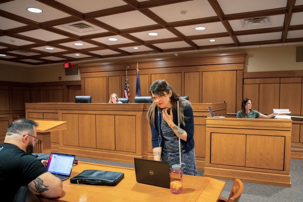 Zoom image: Law student Maura Kutnyak takes part in a mock trial class in the Francis M. Letro Courtroom in O’Brian Hall. Photo: Meredith Forrest Kulwicki 