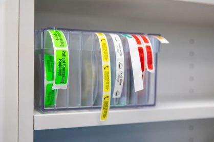 Zoom image: Labels are ready for new prescription bottles. 