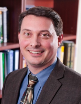 Portrait of Assistant Professor Gregory Homish of the School of Public Health in his Kimbal Tower Office Photograph: Douglas Levere. 