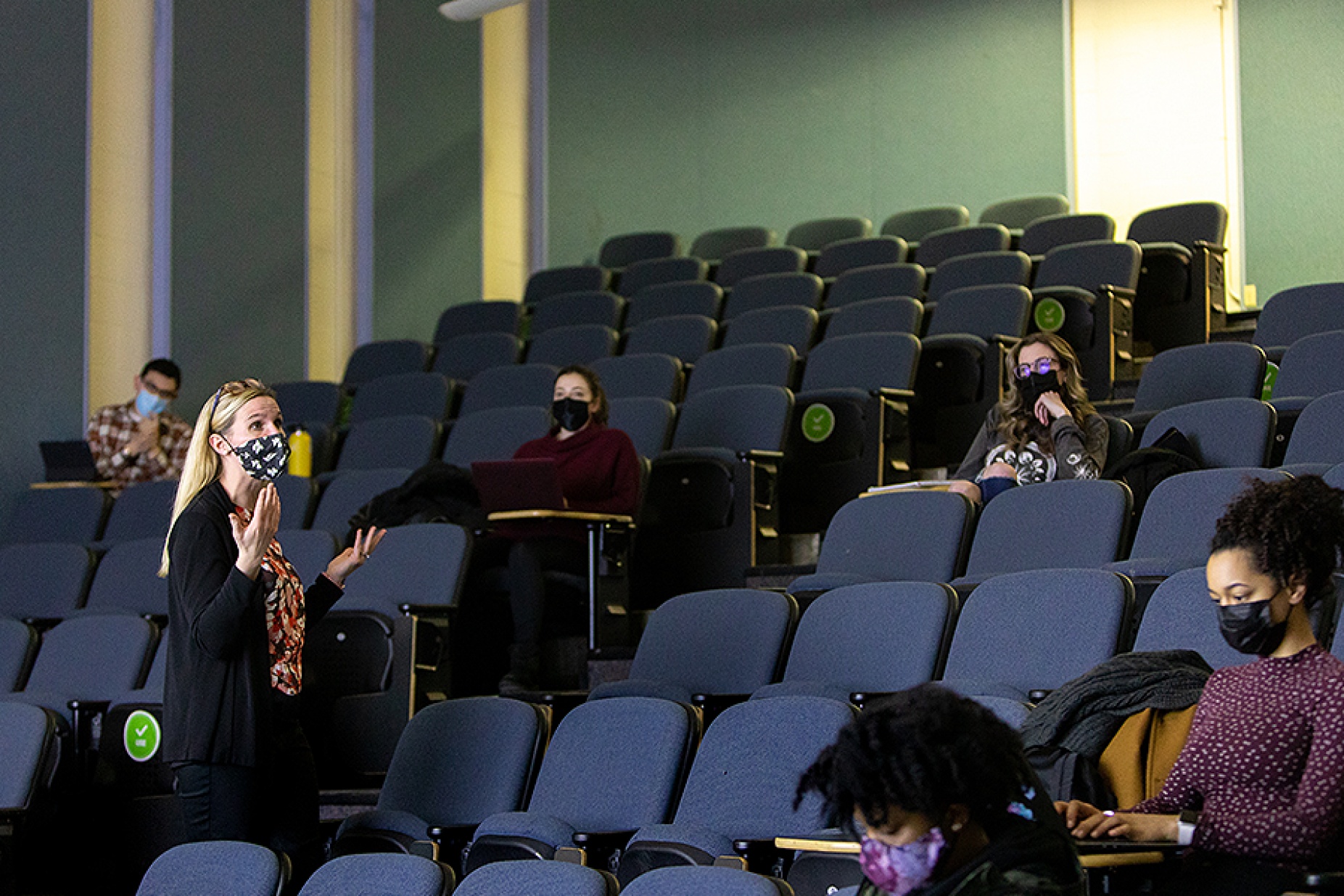Sarahmona Przybyla teaching in an auditorium.