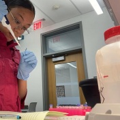 Sophia Jacobs performs research in a lab. 