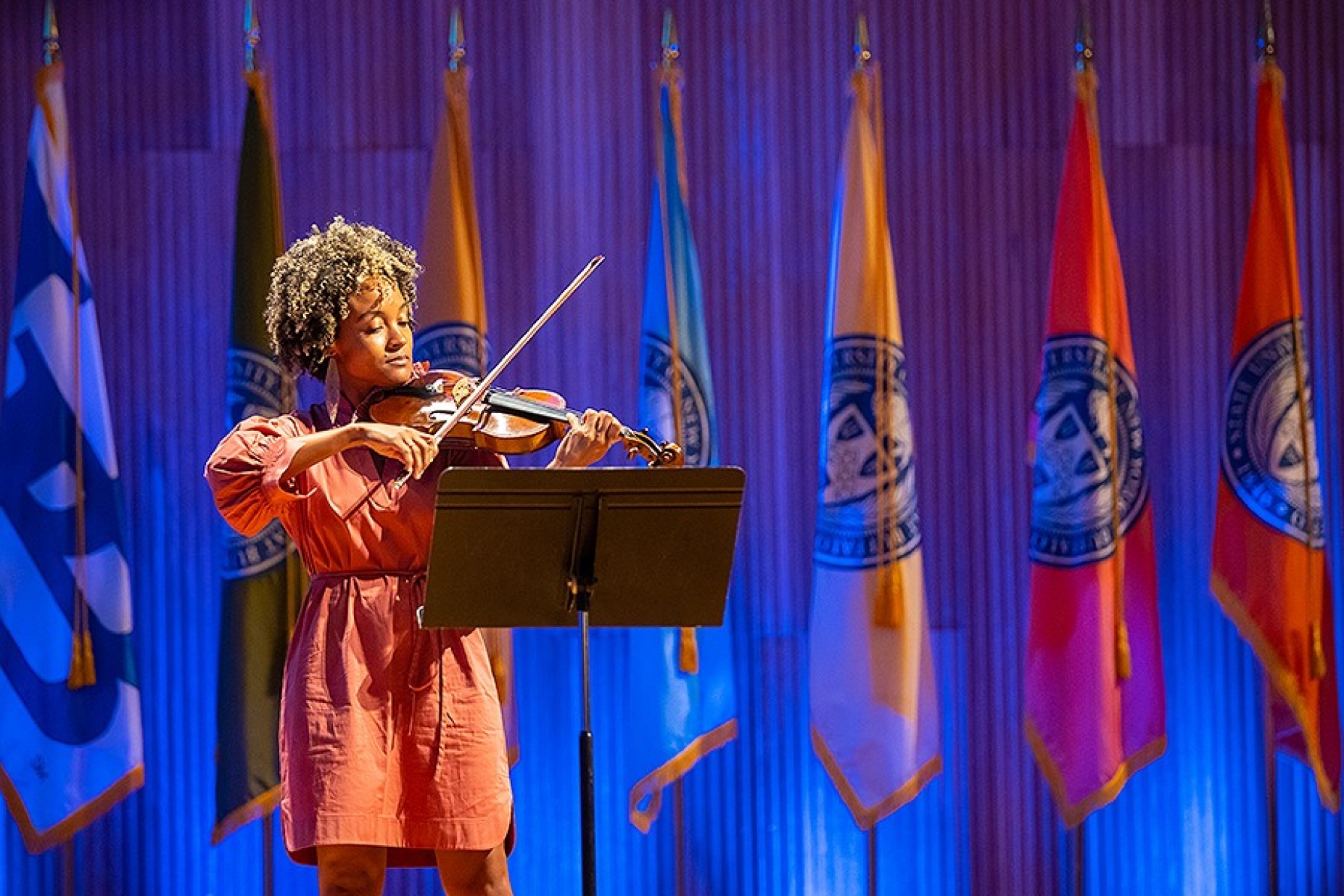 A violinist performs during the 2022 State of the University address. 