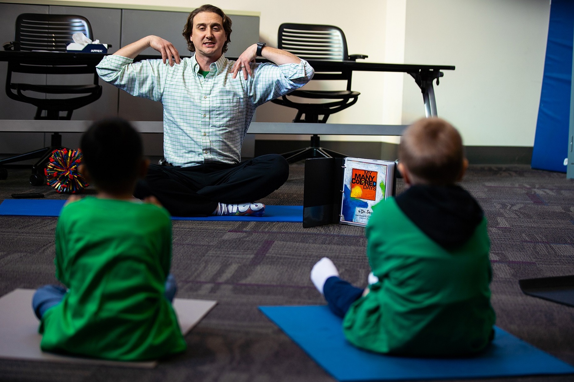 Zoom image: Yoga and mindfulness-based programs for children are known to build body awareness, decrease anxiety and assist stress management, says co-principal investigator Catherine Cook-Cottone, professor of counseling, school and educational psychology. 