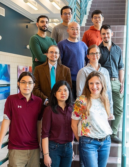 Zoom image: Eva Zurek (bottom right) and students from the Department of Chemistry. Photo: Douglas Levere 