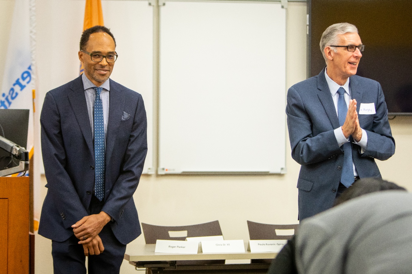 Timothy F. Murphy, MD, right, opens the floor for questions for Robert Gore, MD ’02, following his keynote address. 