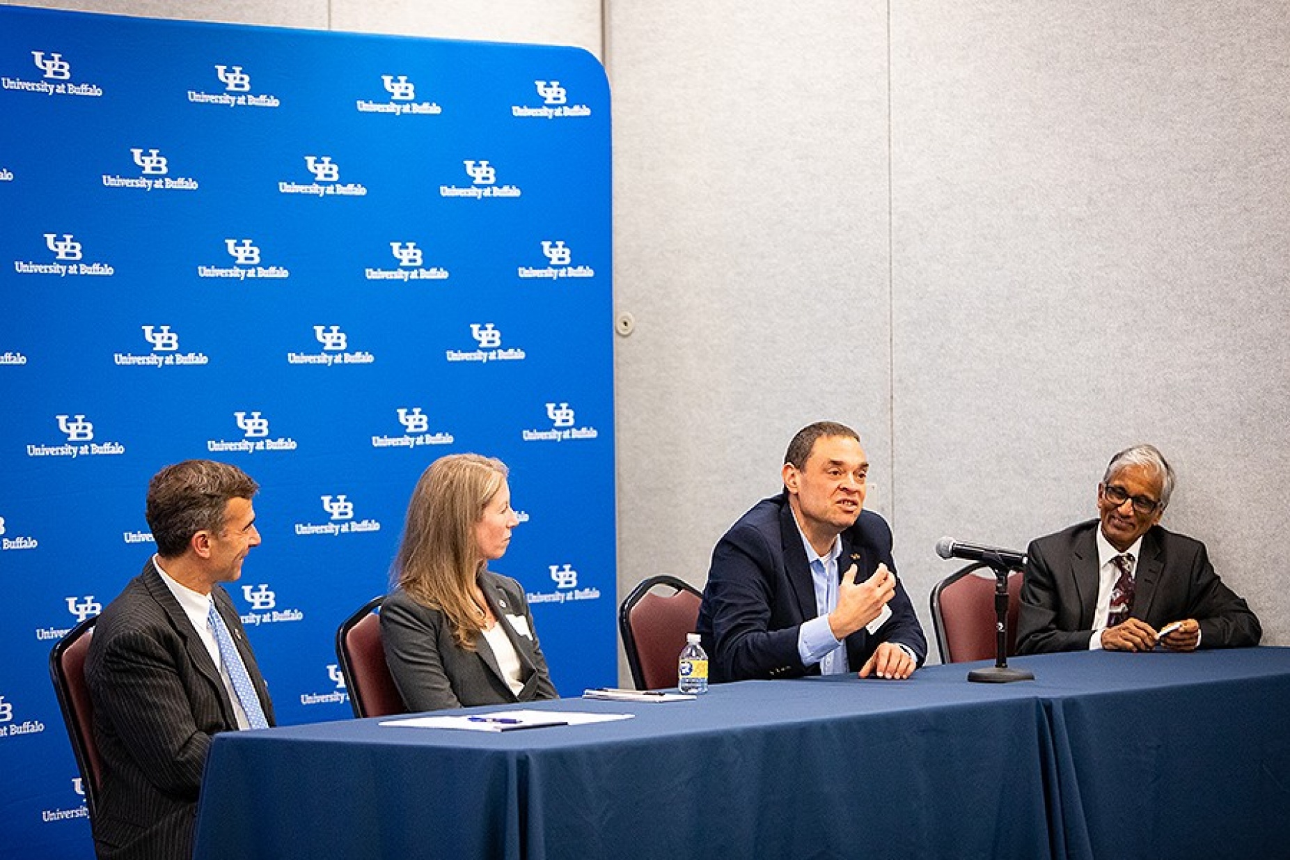 A UB panel featuring (from left) Ryan McPherson, Jennifer Flagg, Mark Swihart and Krishna Rajan talking about UB’s sustainability goals and commitment to clean energy. 