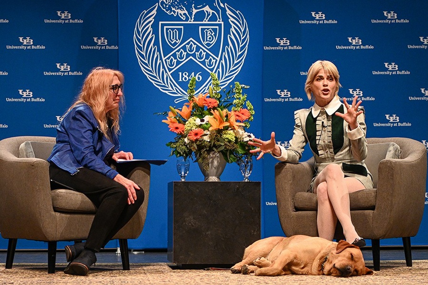 Actress Selma Blair on stage with Bianca Weinstock-Guttman and her service dog during her Distinguished Speakers series appearance. 