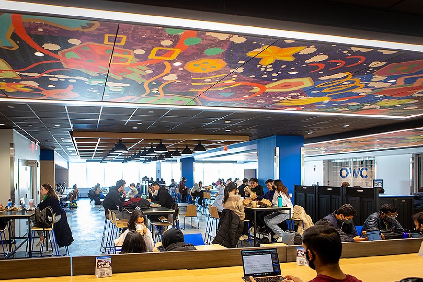 Bright, colorful artwork accentuates the ceilings in some areas. 