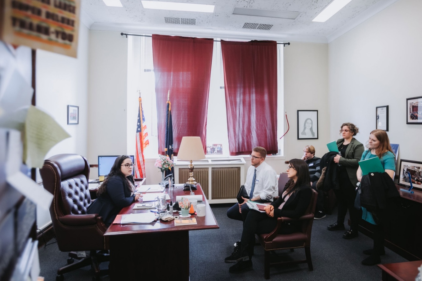 UB students Syd Snyder and Kayliee Bertrand-Henretta and students from other New York universities gather in the office of Sen. Julia Salazar's staff. 
