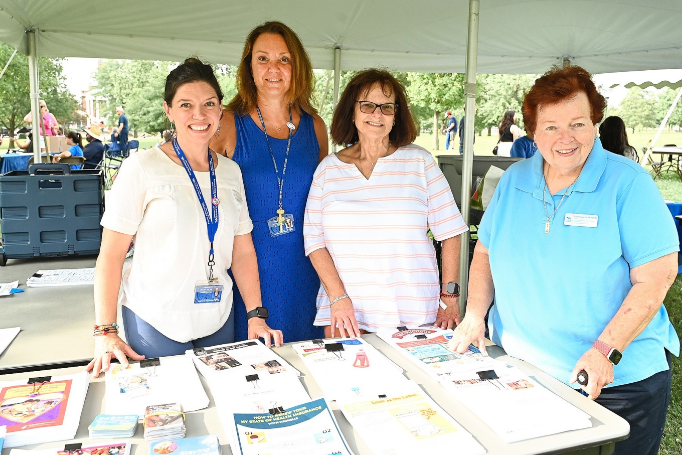 Molli Oldenburg, Mary Rhinehart, Amy Lyons, and Susan Grinslade, tabling at UB on the Green for Million Hearts Initiative. 