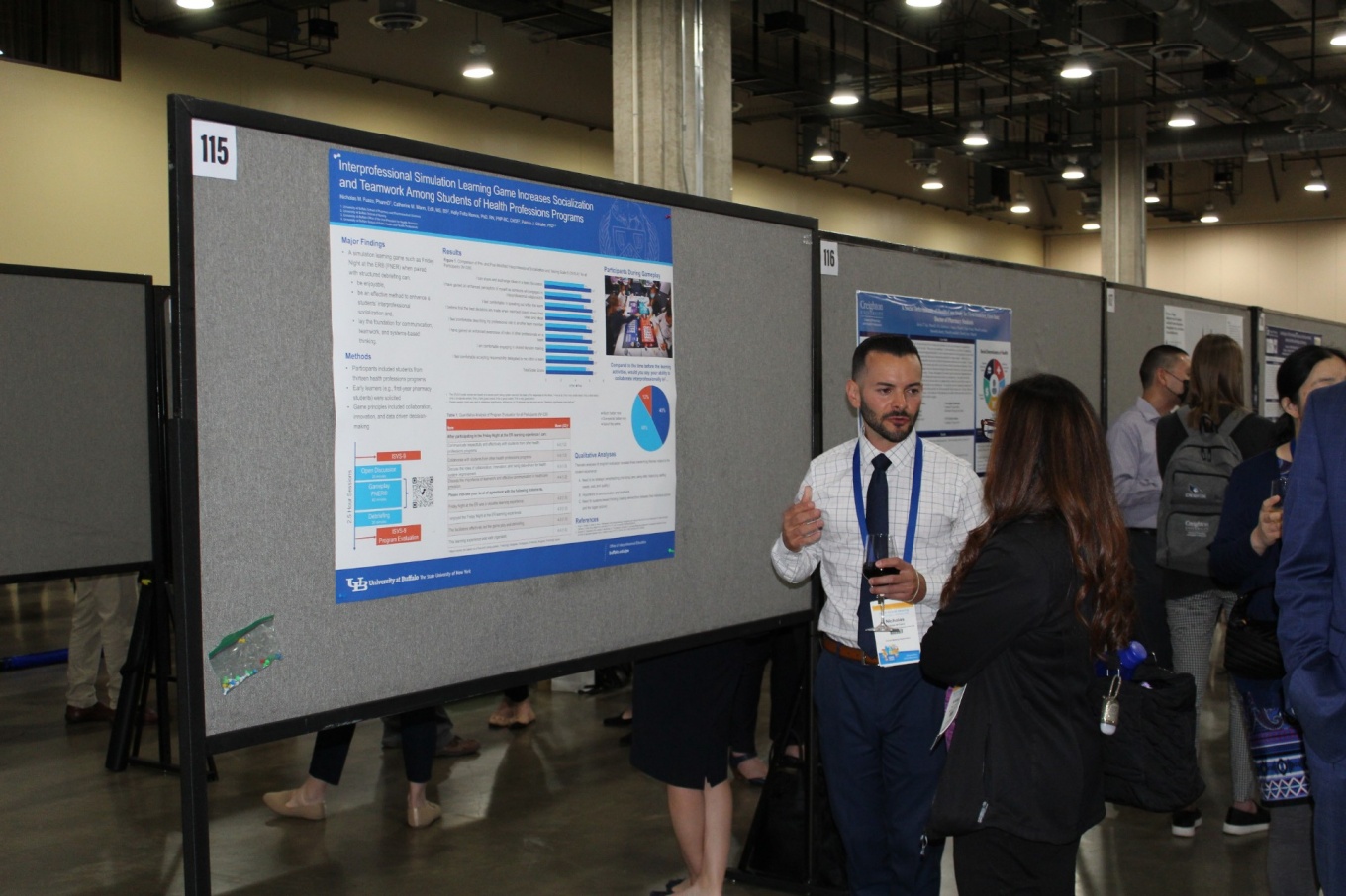 Nicholas Fusco, PharmD, presenting research poster. 