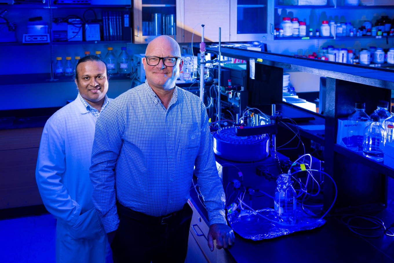 Zoom image: University at Buffalo senior staff scientist Surya Venkata Pulavarti and Distinguished Professor of Chemistry Thomas Szyperski study the cold unfolding of proteins. Szyperski is a principal investigator on a new National Science Foundation grant to continue that work. Photo: Douglas Levere 