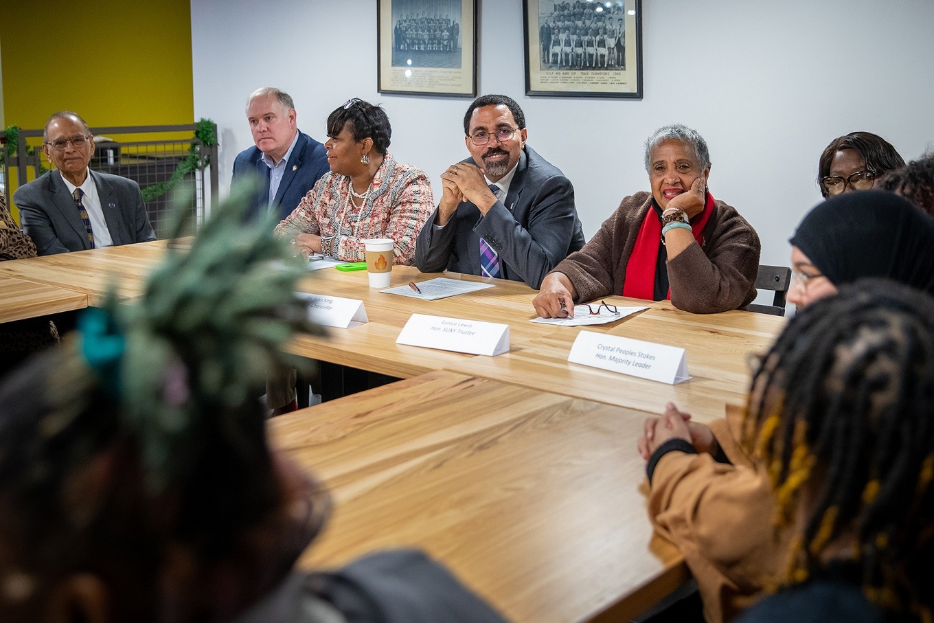 President TRipathi, far left, and other administrators listen as BPS seniors discuss the aspirations. 