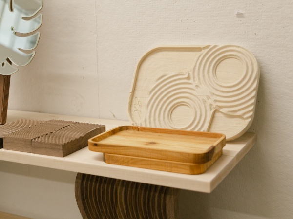 Zoom image: Students used the CNC router to create bespoke jewelry trays, one of several furniture projects developed with digital techologies. Photo: Lukas Iverson 