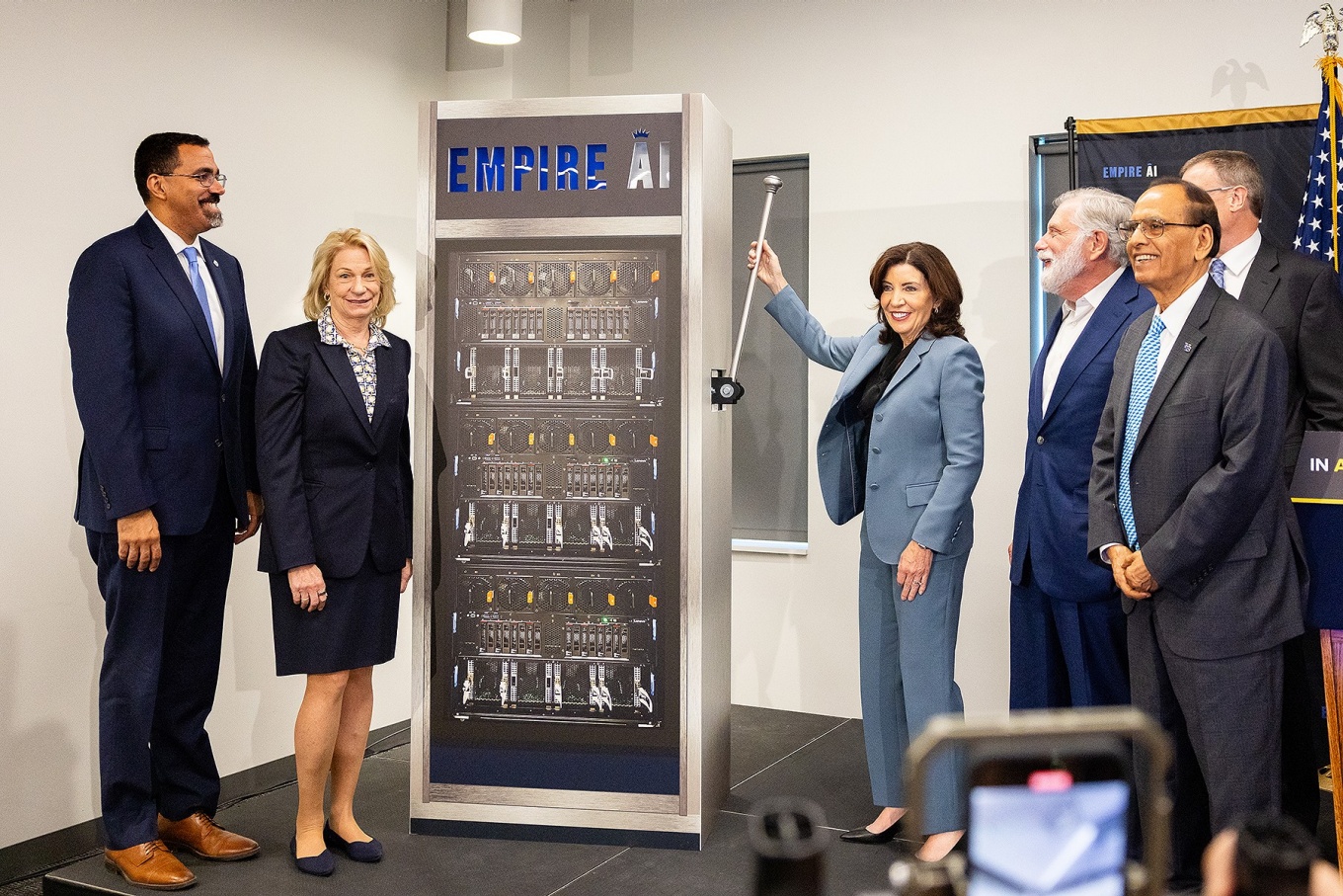 From left, John B. King Jr, Marilyn Simons, Kathy Hochul, Tom Secunda, Satish Tripathi and Robert Harrison during Empire AI temporary location announcement. 