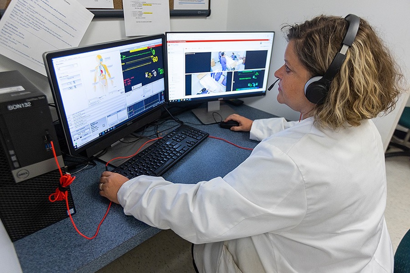 Kelly Foltz-Ramos monitors a nursing simulation.