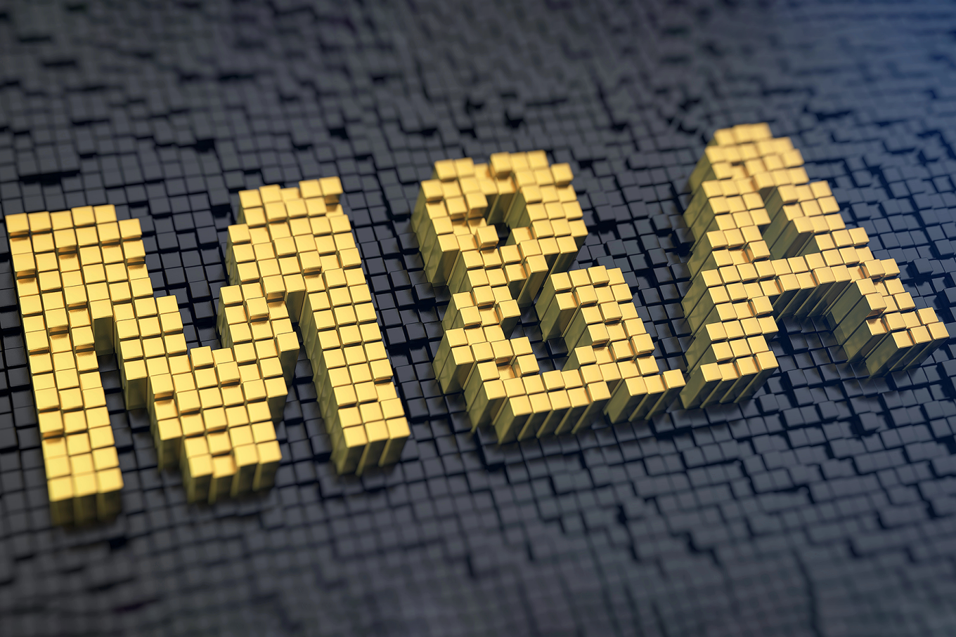 Concept of mergers and acquisitions featuring black cubes in the background and gold cubes forming "M&A.". 