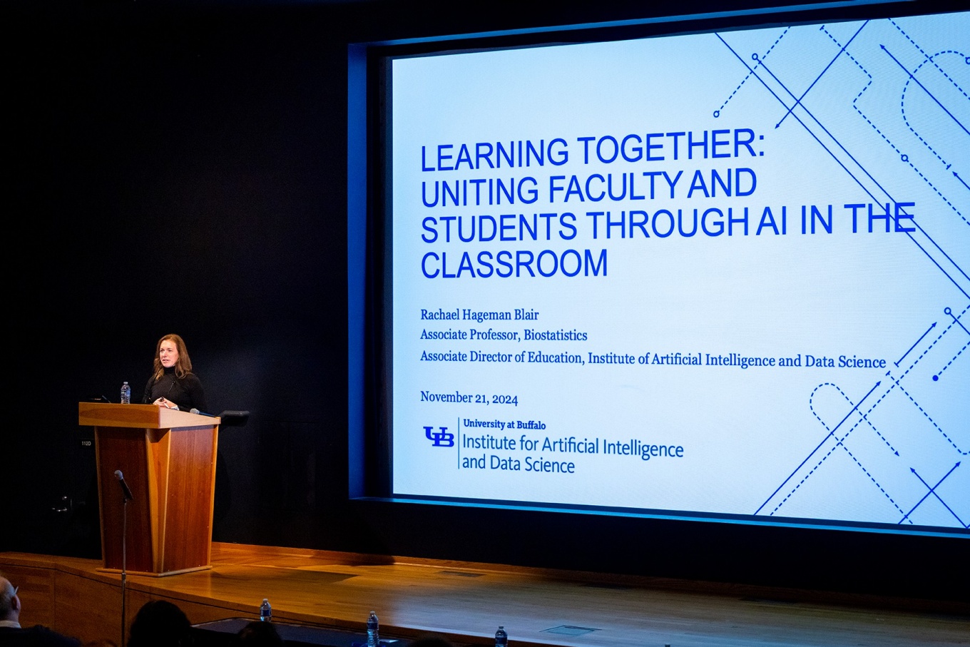 Rachael Hageman Blair delivers the keynote address at an AI forum.