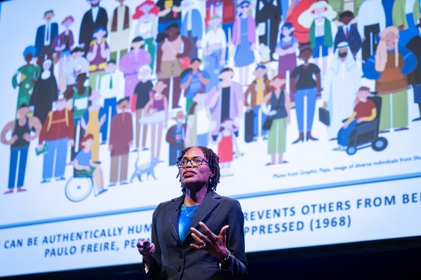 Zoom image: Ruqaiijah Yearby, Kara J. Trott Professor in Health Law at the Moritz College of Law at The Ohio State University, delivered the symposium&rsquo;s keynote, &ldquo;Fulfilling the Promise of Equality.&rdquo; Photo: Meredith Forrest Kulwicki 