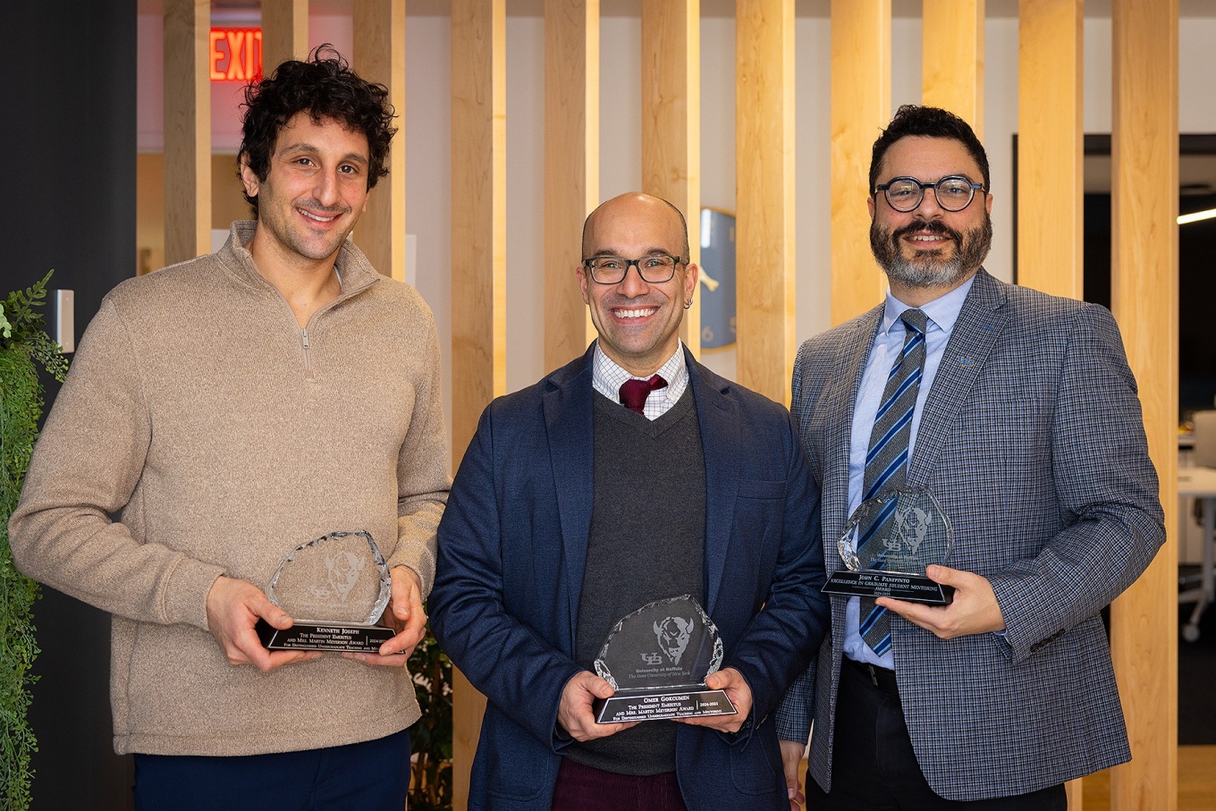 Mentoring award winners from left, Kenneth Joseph, Omer Gokcumen, and John C. Panepinto. 