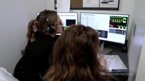 UB School of Nursing graduate assistants using control room software. 